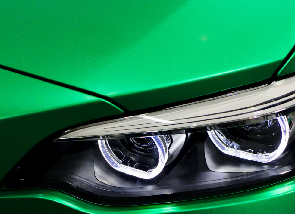 Green vinyl wrap bonnet and headlight detail